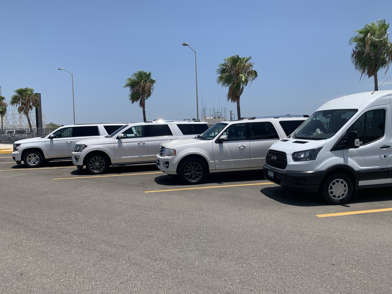 Cabo Ground Services SUVs and van representing today's private transportation operation